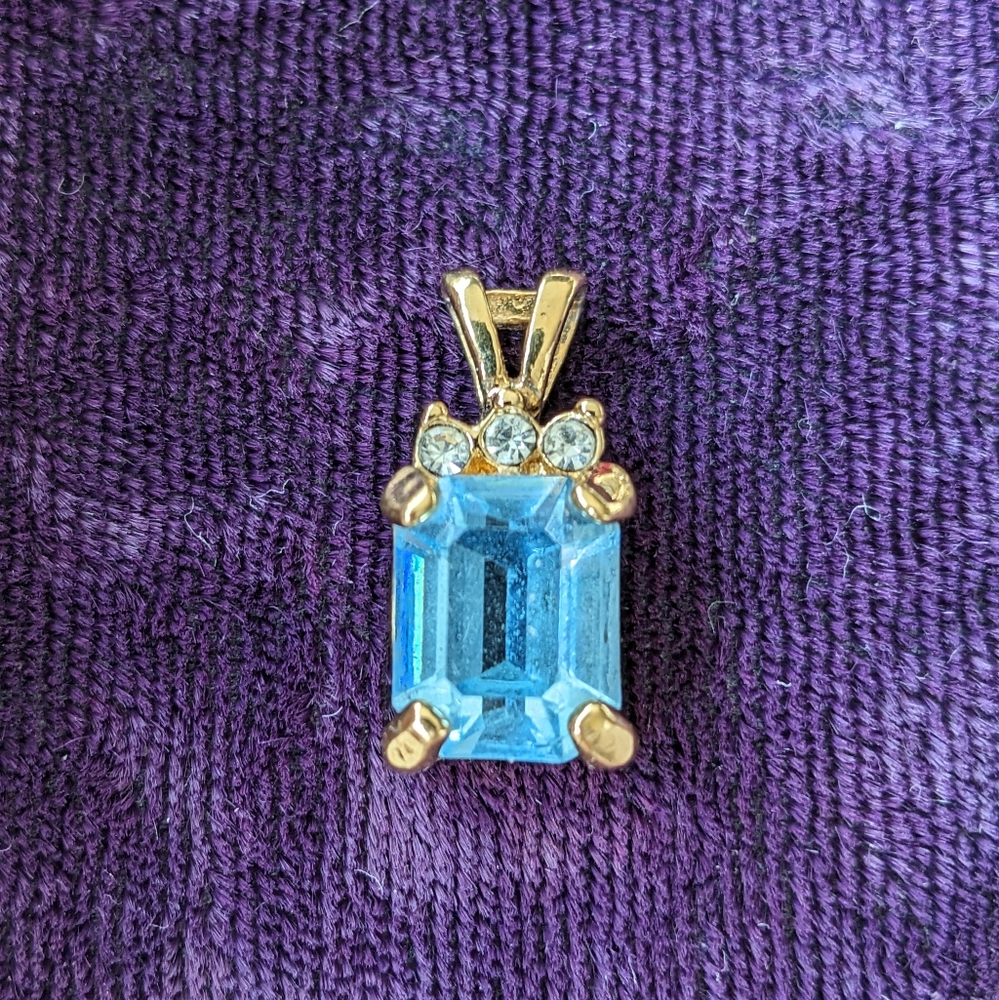 10K Gold Plated Pendant With Light Blue Color Crystal